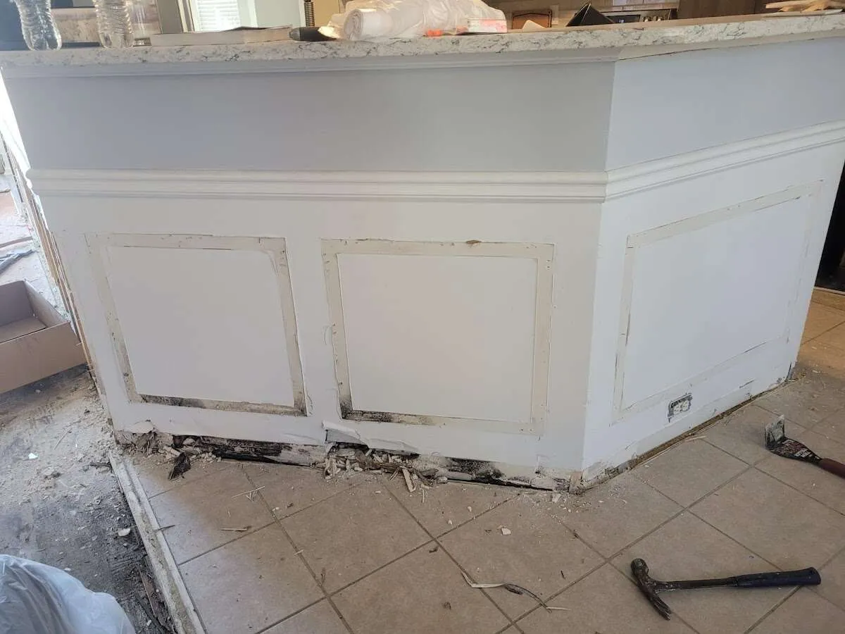 Water damage and mold on kitchen during Storm Damage Restoration in Seymour